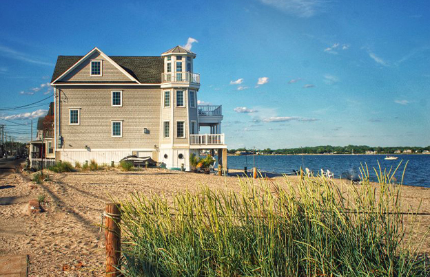 Coastal Closings: Navigating Insurance and Climate Challenges in MA & NH